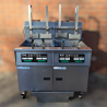 Used Pitco SSH75C-FD/FF 2 Bank Gas Deep Fryer with Filtration, Computer Controls and Automatic Basket Lift - ST25UK384